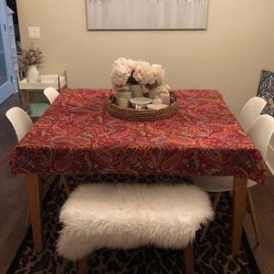 58” x 98” cotton / poly rectangular tablecloth . Made in Pakistan.